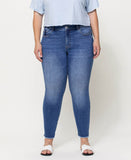 Front product images of Wolf N Crane - Plus Mid Rise Raw Hem Crop Skinny Jeans
