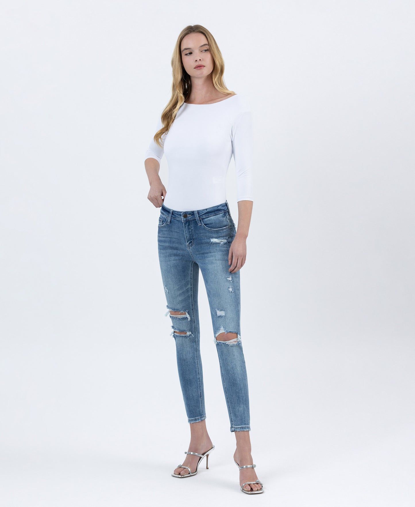 Left 45 degrees product image of Clear Headed - Mid Rise Skinny Jeans