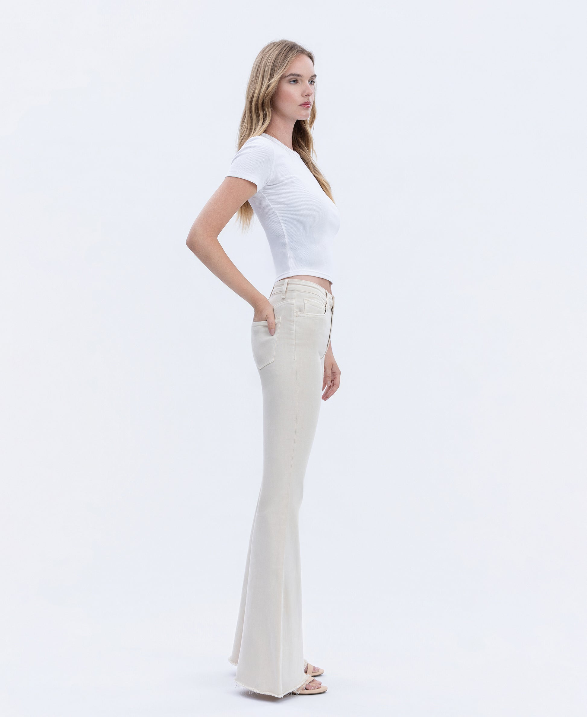 Right 45 degrees product image of Parchment - High Rise Raw Hem Super Flare Jeans