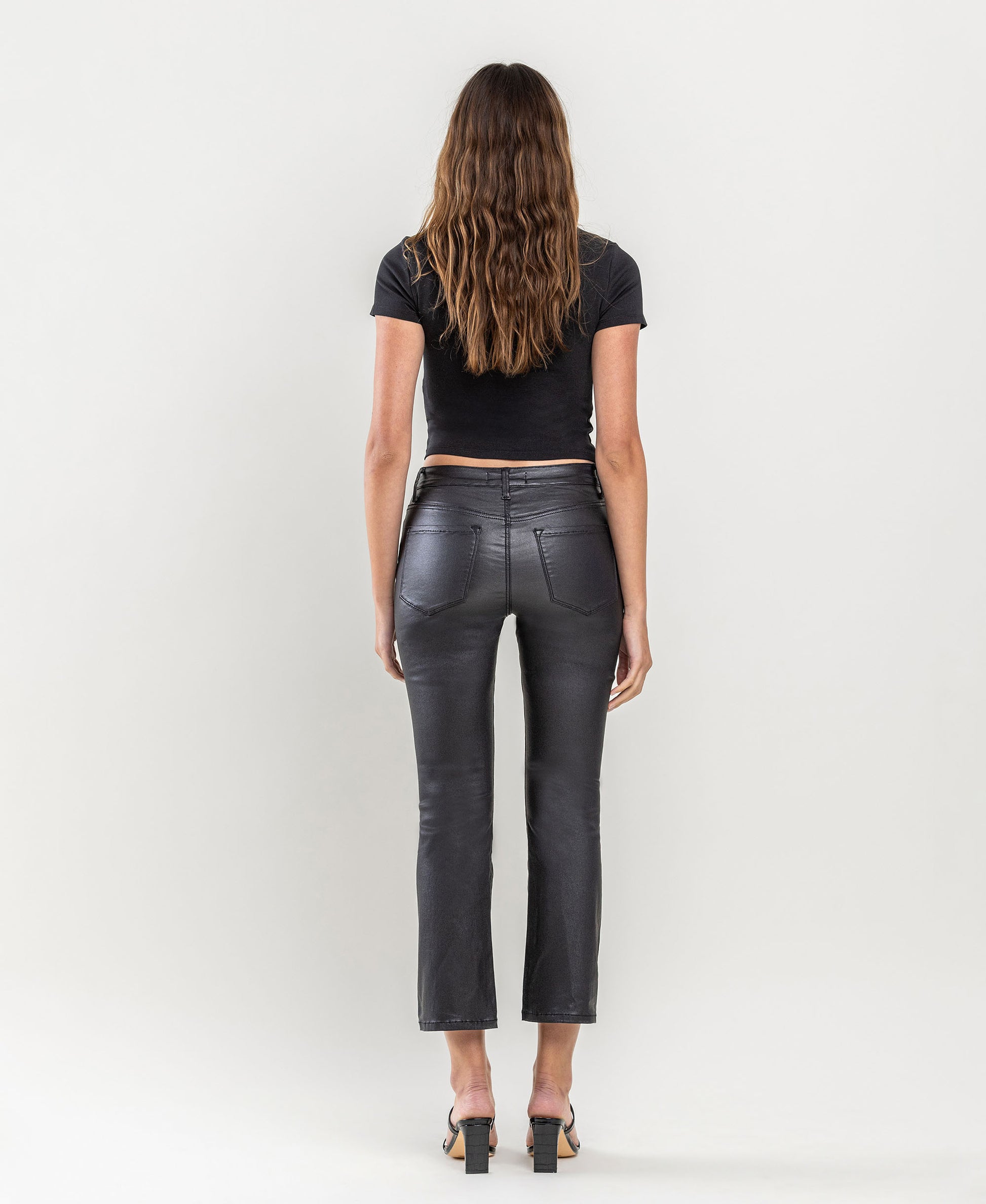 Back product images of Jet Black - High Rise Coated Crop Flare Jeans