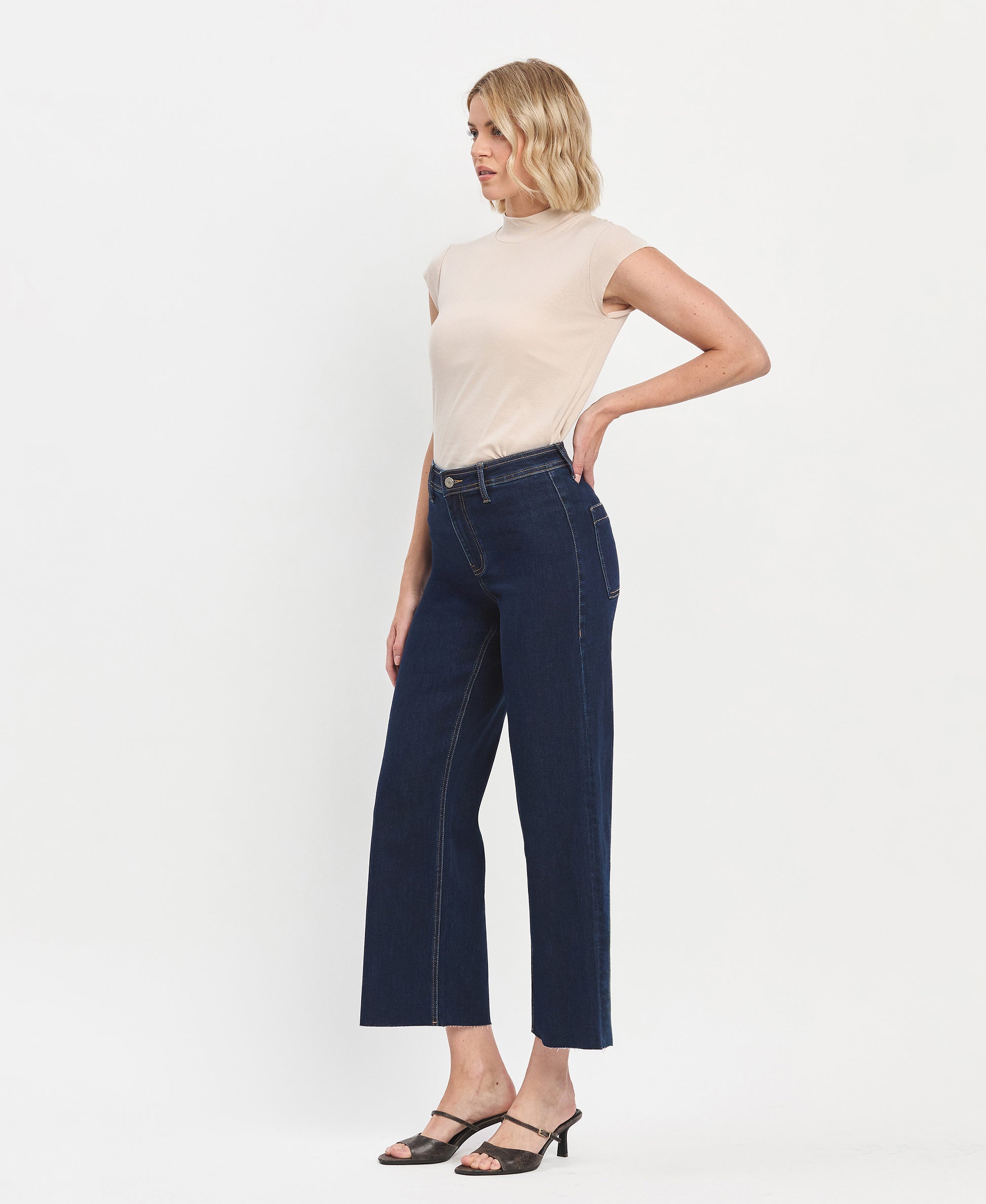 Right 45 degrees product image of Left 45 degrees product image of Genial - High Rise Clean Cut Raw Hem Wide Leg Jeans