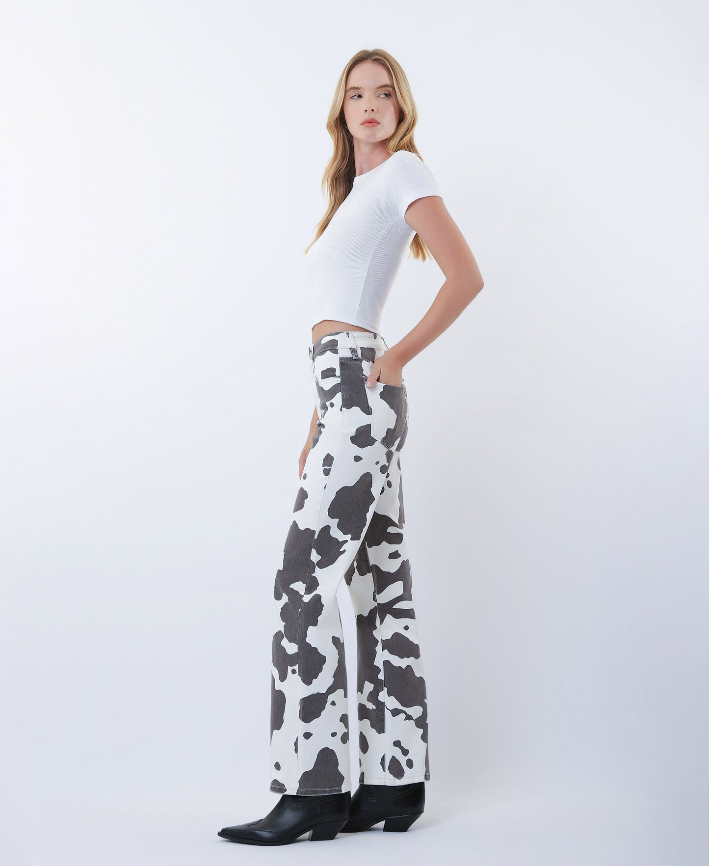 Left side product images of Cow Print - High Rise Full Length Wide Leg Jeans