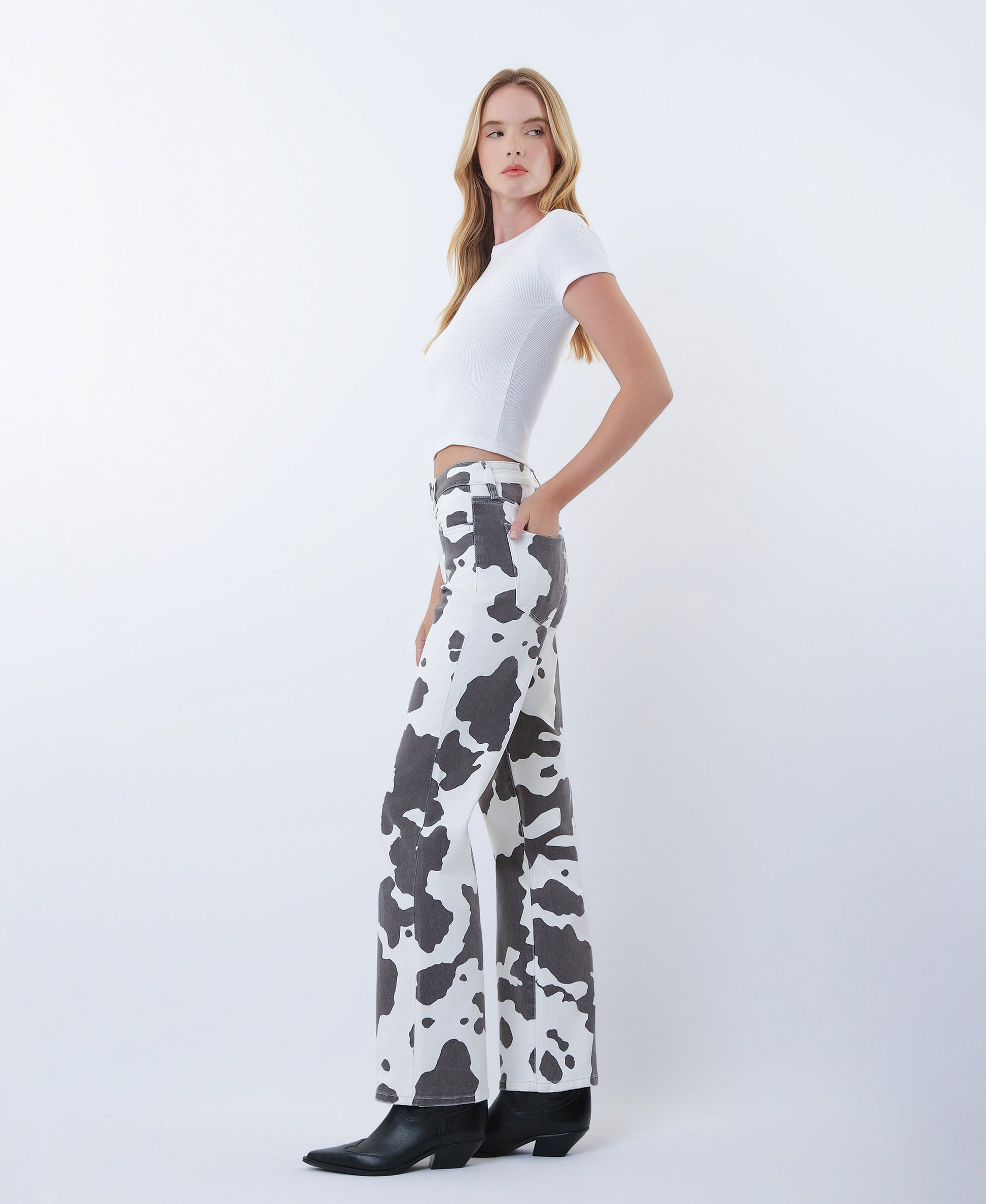 Left side product images of Cow Print - High Rise Full Length Wide Leg Jeans