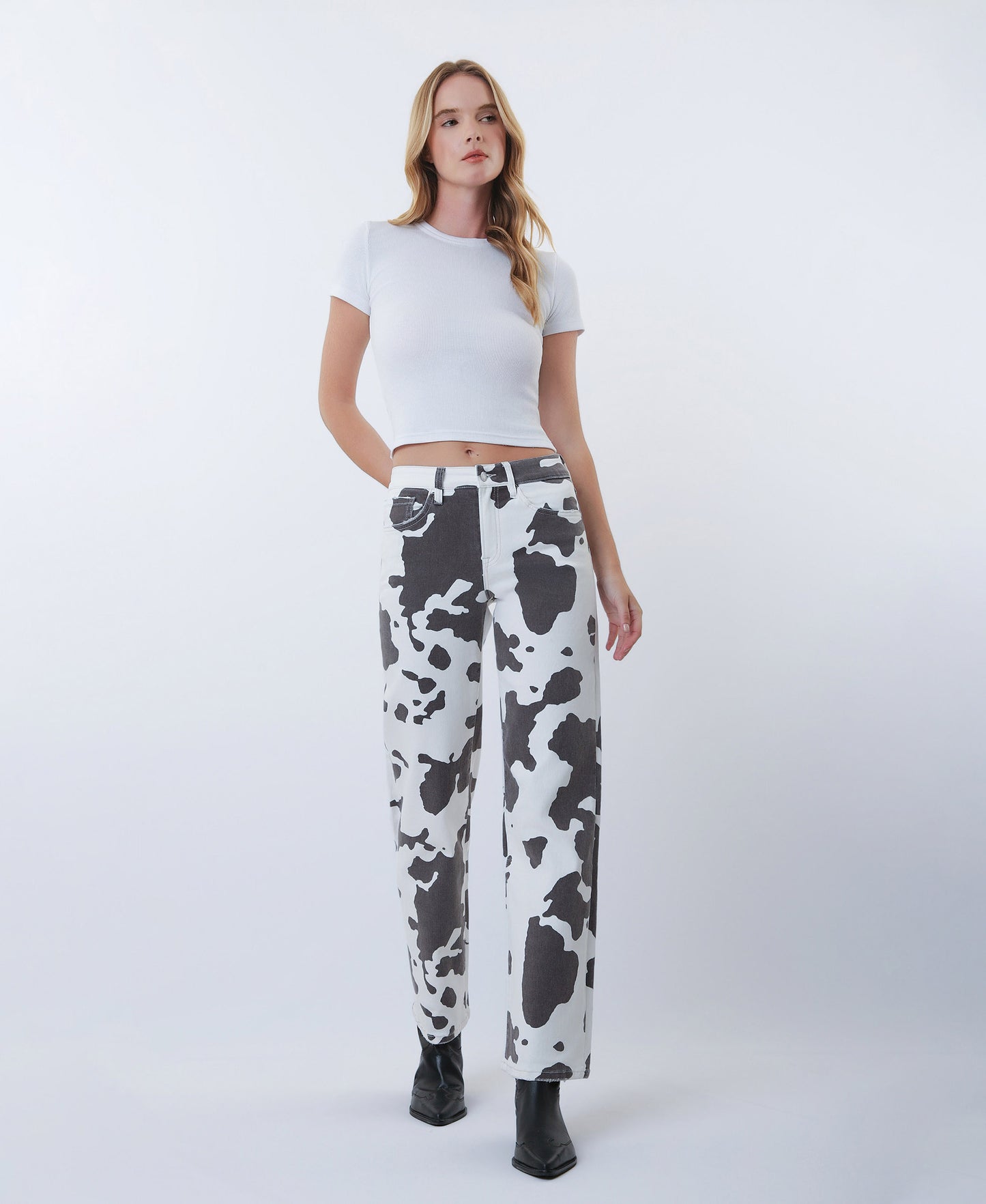 Front product images of Cow Print - High Rise Full Length Wide Leg Jeans